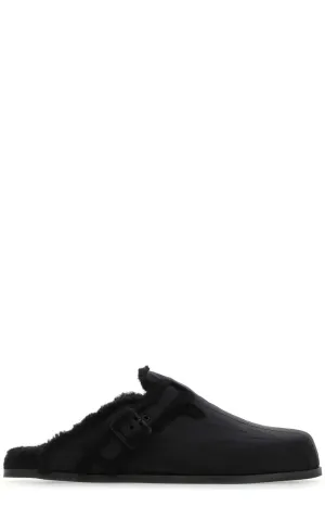 Valentino Logo Embossed Shearling Mules